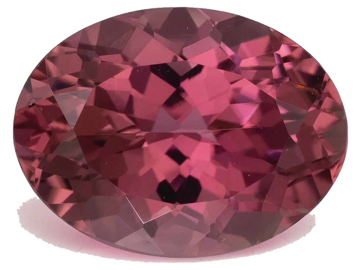 Oval mixed-cut natural pink tourmaline in a medium-dark slightly purplish pink with raspberry depth, photographed face-up on a pale gray background at Sapphire Row