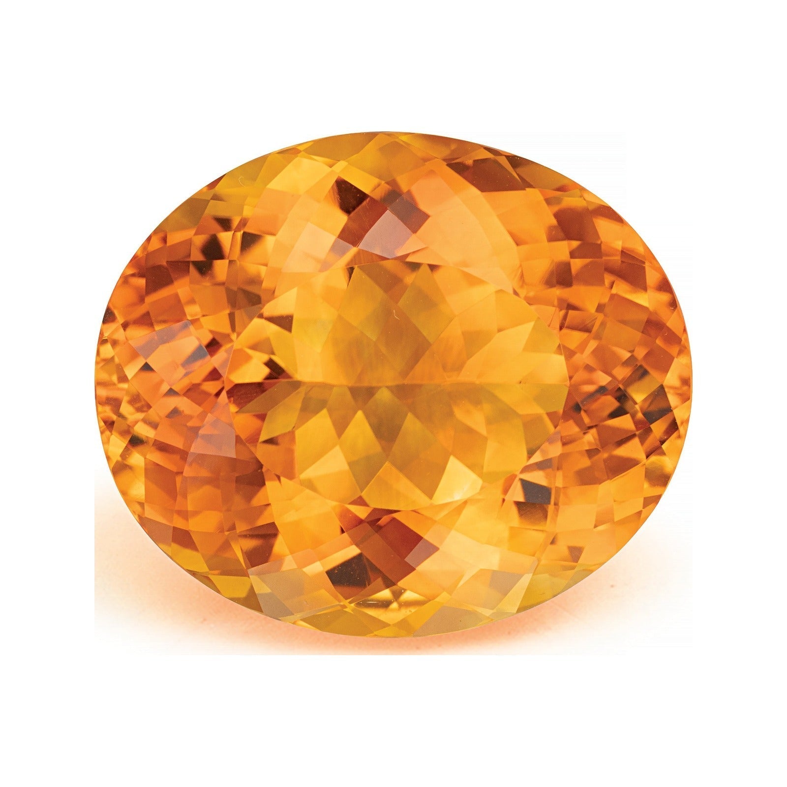 Large oval checkerboard-cut natural citrine from Brazil in a vivid medium orange with a golden yellow core and deeper reddish flashes through the pavilion, photographed face-up on a white background at Sapphire Row