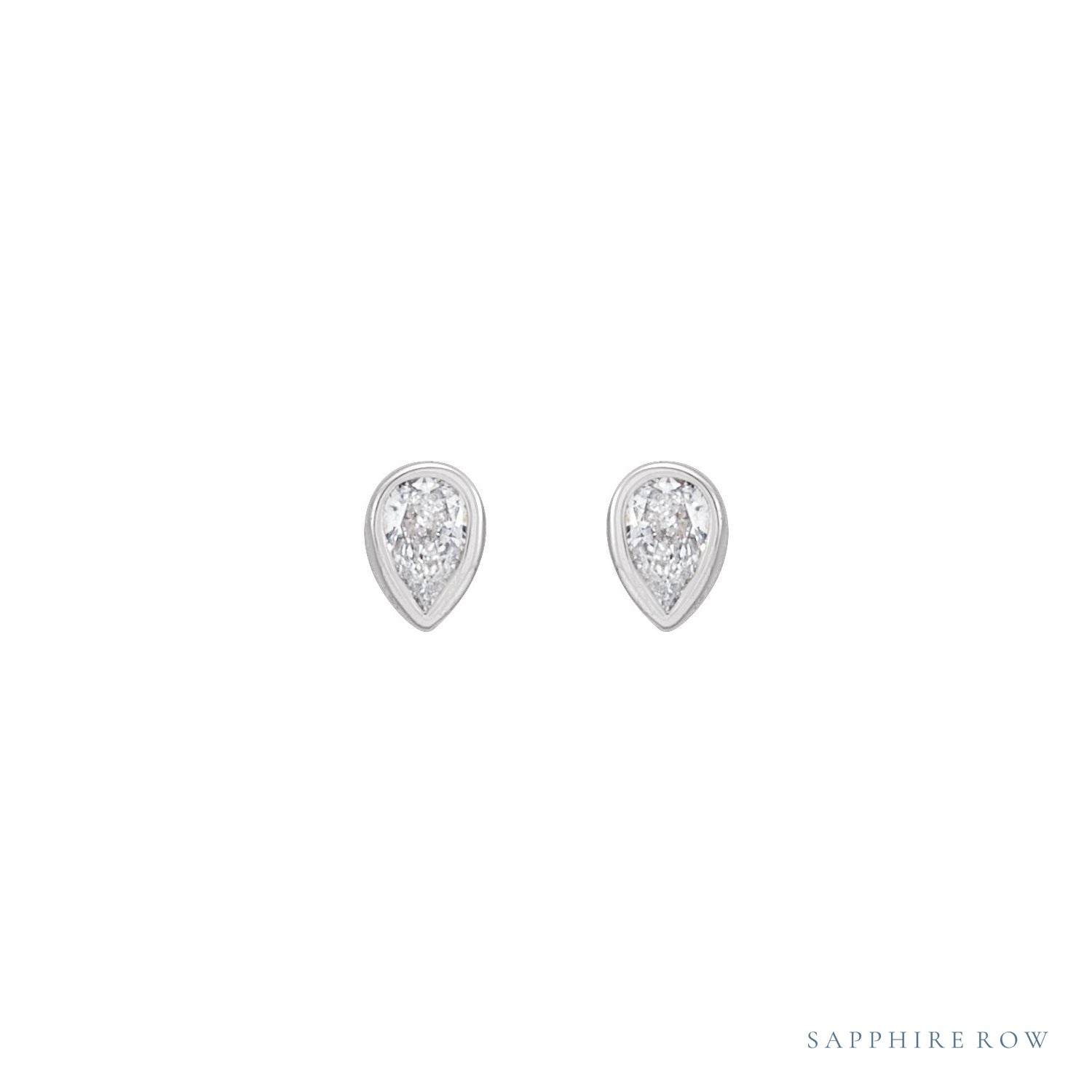 Sapphire Row Natural Diamond Pear Bezel Studs - Platinum, 1/10 CTW (view 2)
