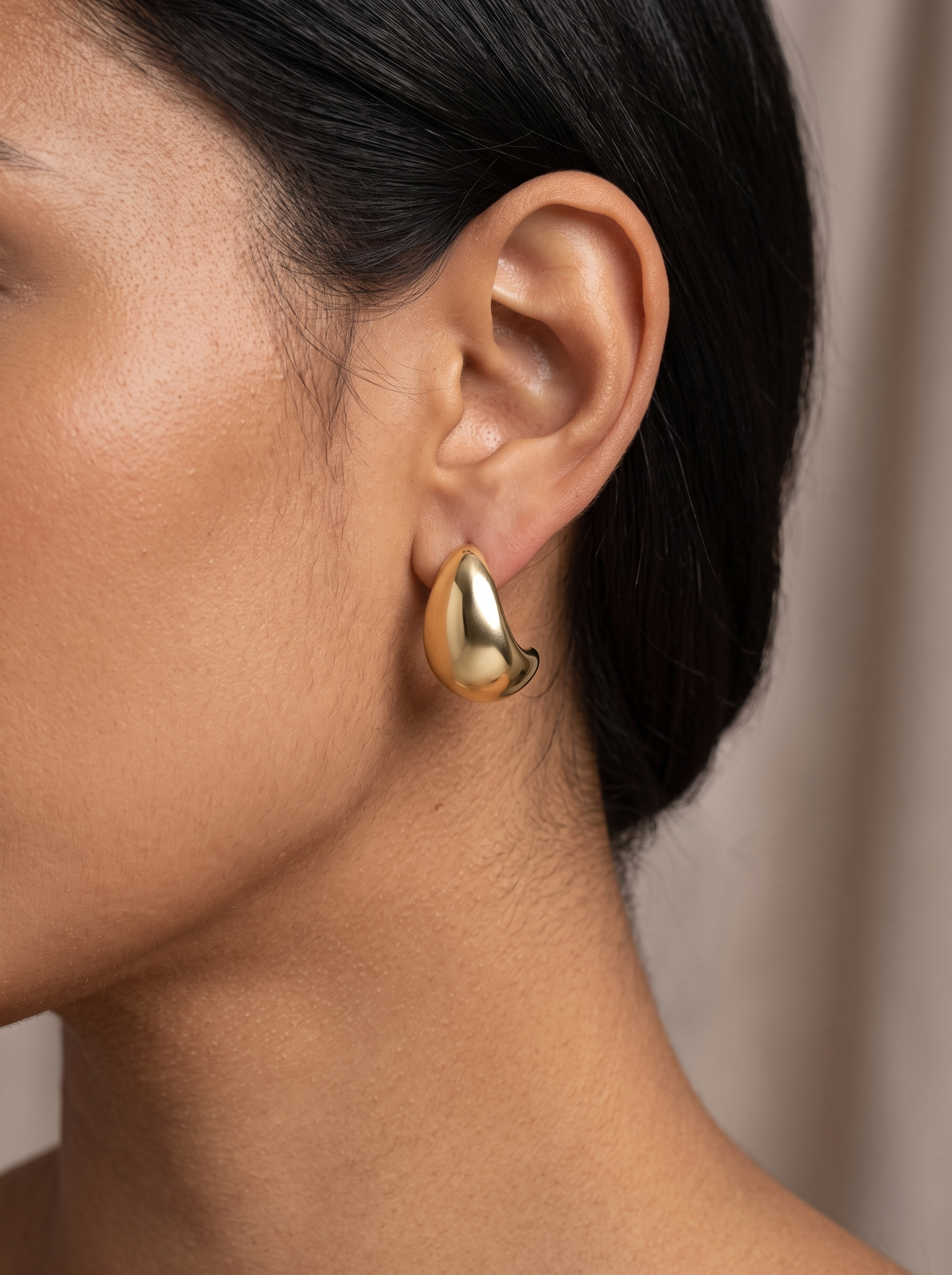 Gold Cloud Earrings in 14K Yellow Gold, worn on the ear