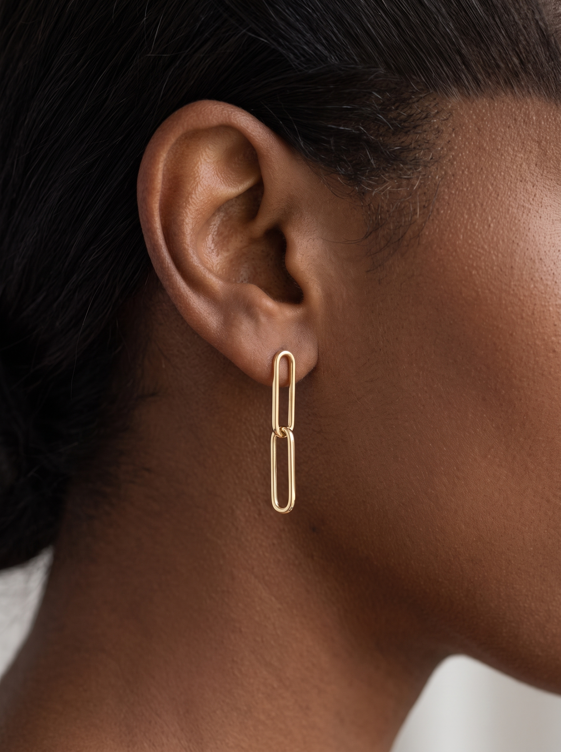 Gold Paperclip Link Earrings in 14K Yellow Gold, worn on the ear