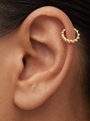 Gold Rope Ear Cuff in 10K Yellow Gold, shown close on the ear