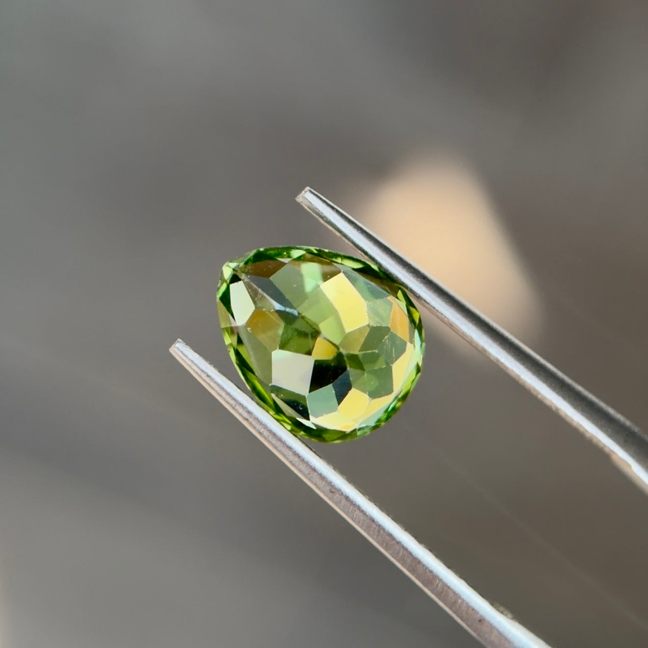 2.39 ct Natural Peridot Olive Green – Pear Cut – AIG Certified