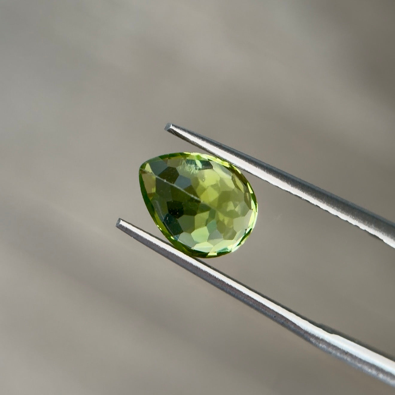 2.42 ct Natural Peridot Olive Green – Pear Cut – AIG Certified