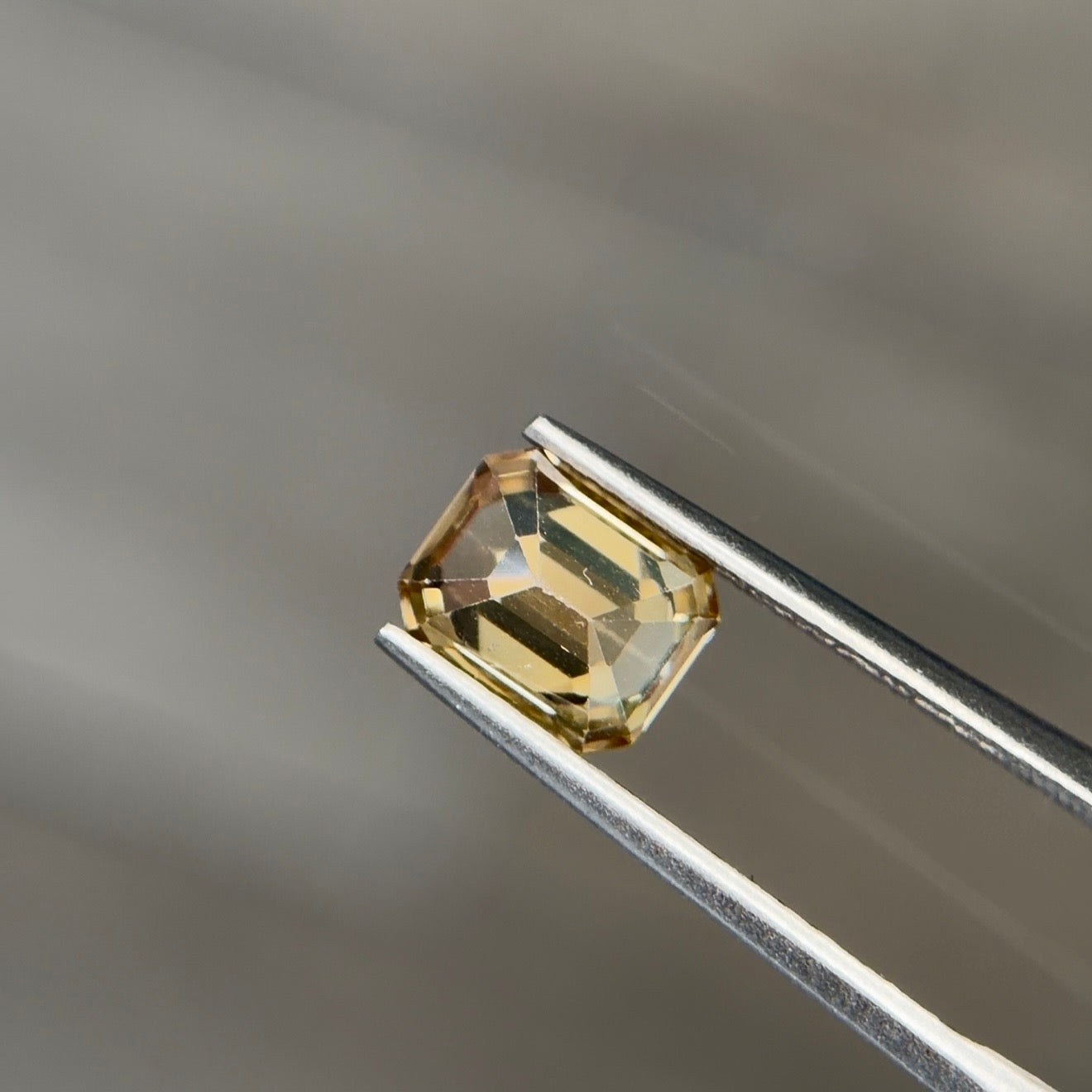 1.97 ct Natural Zircon Yellow – Emerald Cut – AIG Certified