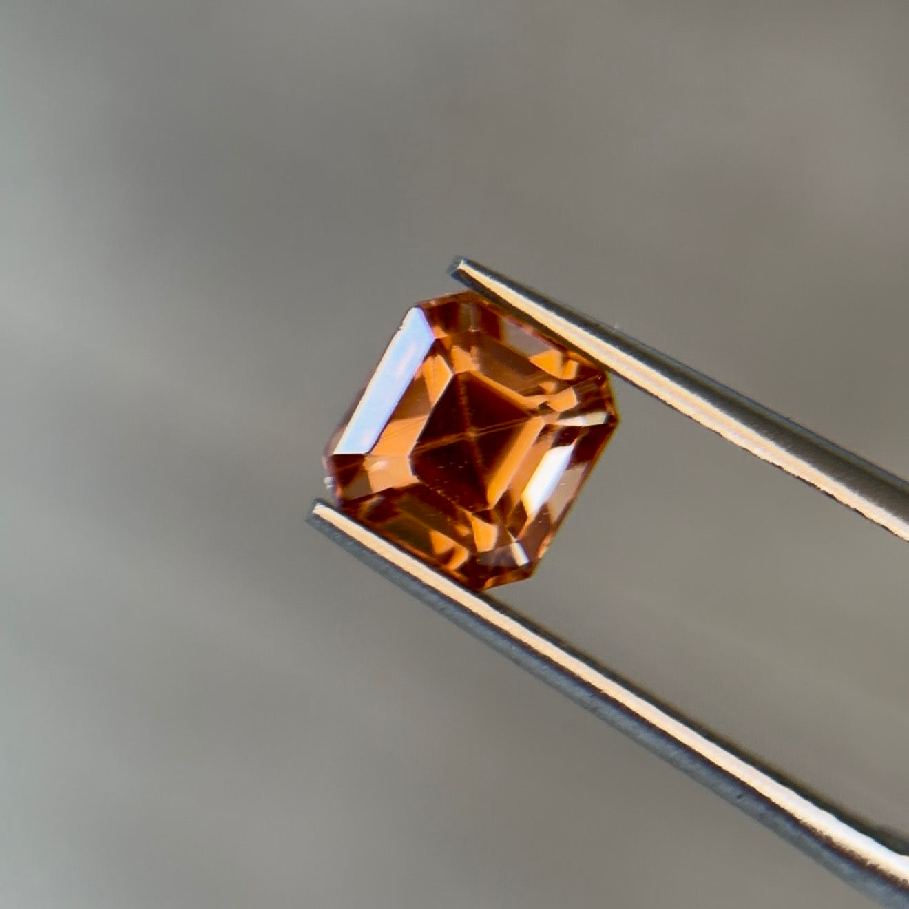 Sapphire Row 2.40 ct Natural Zircon Brownish Orange, Emerald Cut, AIG Certified