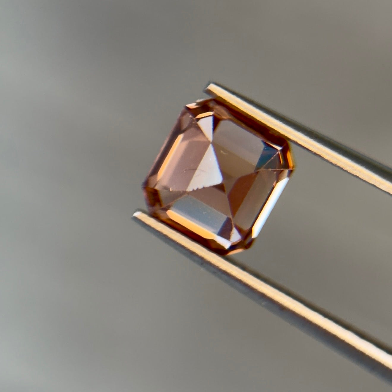 Sapphire Row 2.40 ct Natural Zircon Brownish Orange, Emerald Cut, AIG Certified