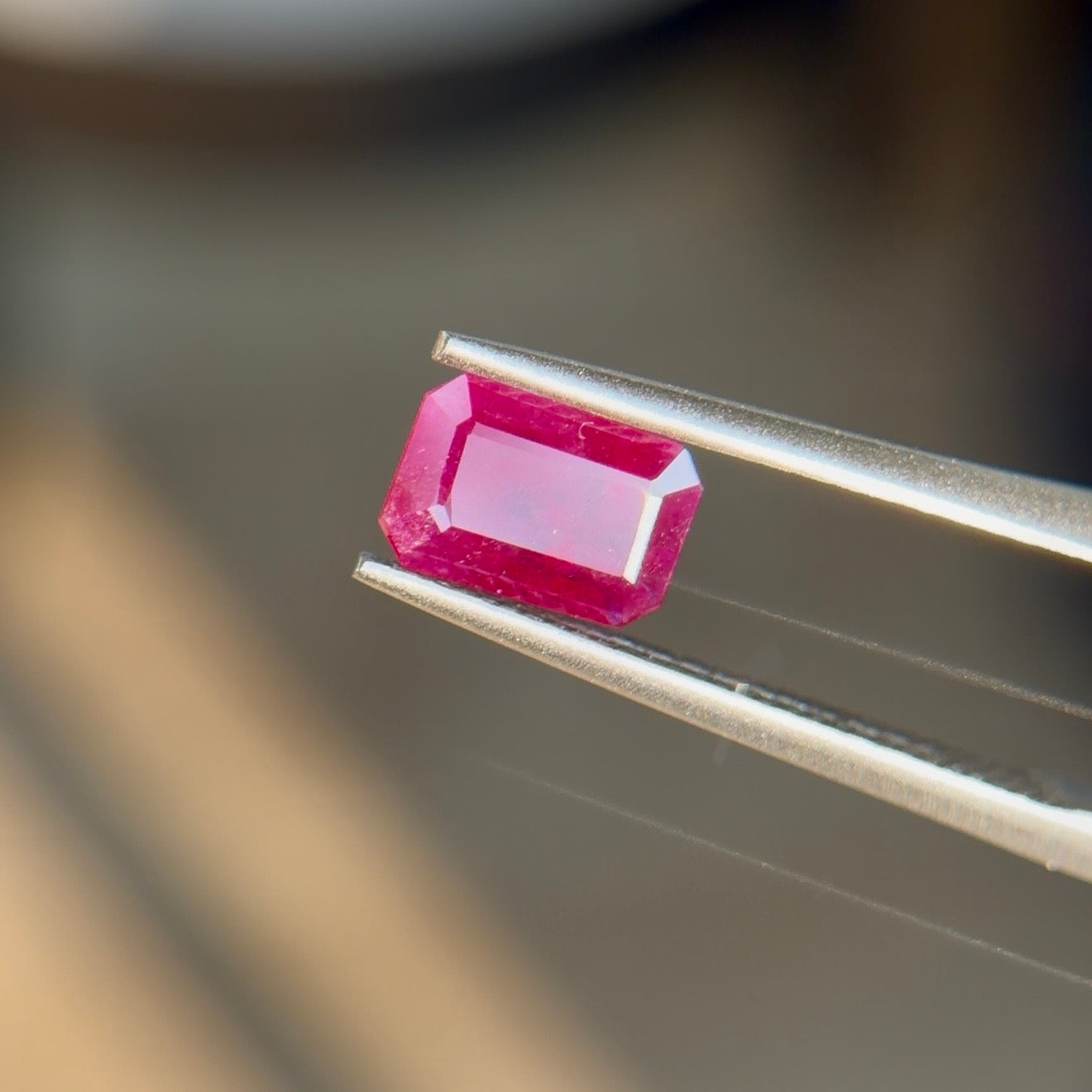 0.61 ct Natural Ruby Red Heated – Emerald Cut – Mozambique – AIG Certified