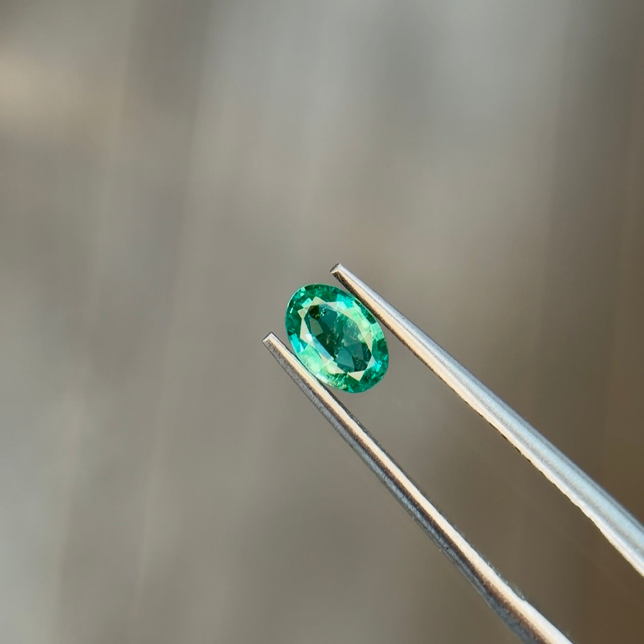 Sapphire Row 0.31 ct Natural Emerald Green, Oval Cut, Zambia, AIG Certified