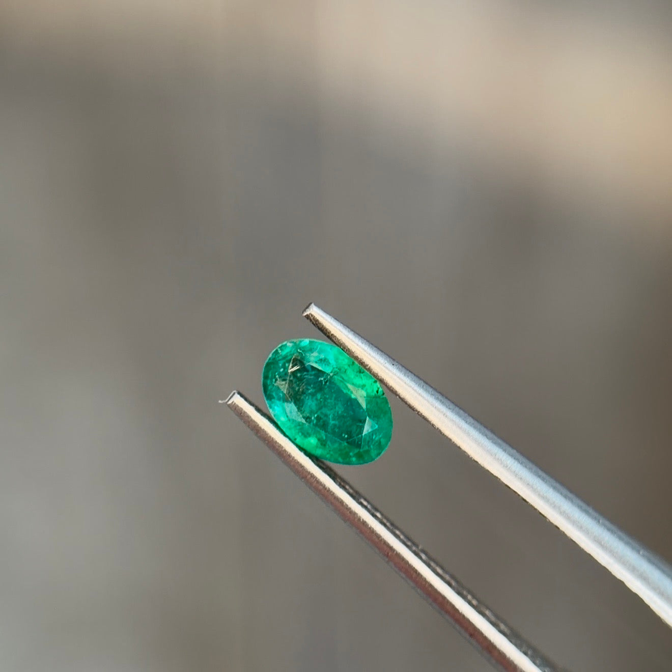 0.33 ct Natural Emerald Green – Oval Cut – Zambia – AIG Certified