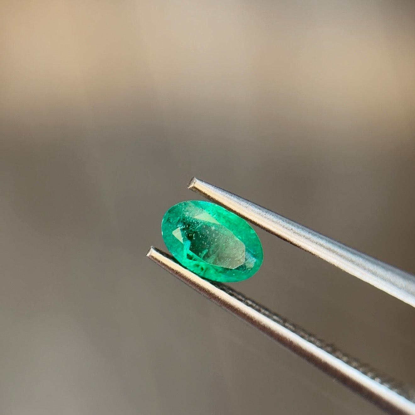 Sapphire Row 0.37 ct Natural Emerald Green, Oval Cut, Zambia, AIG Certified