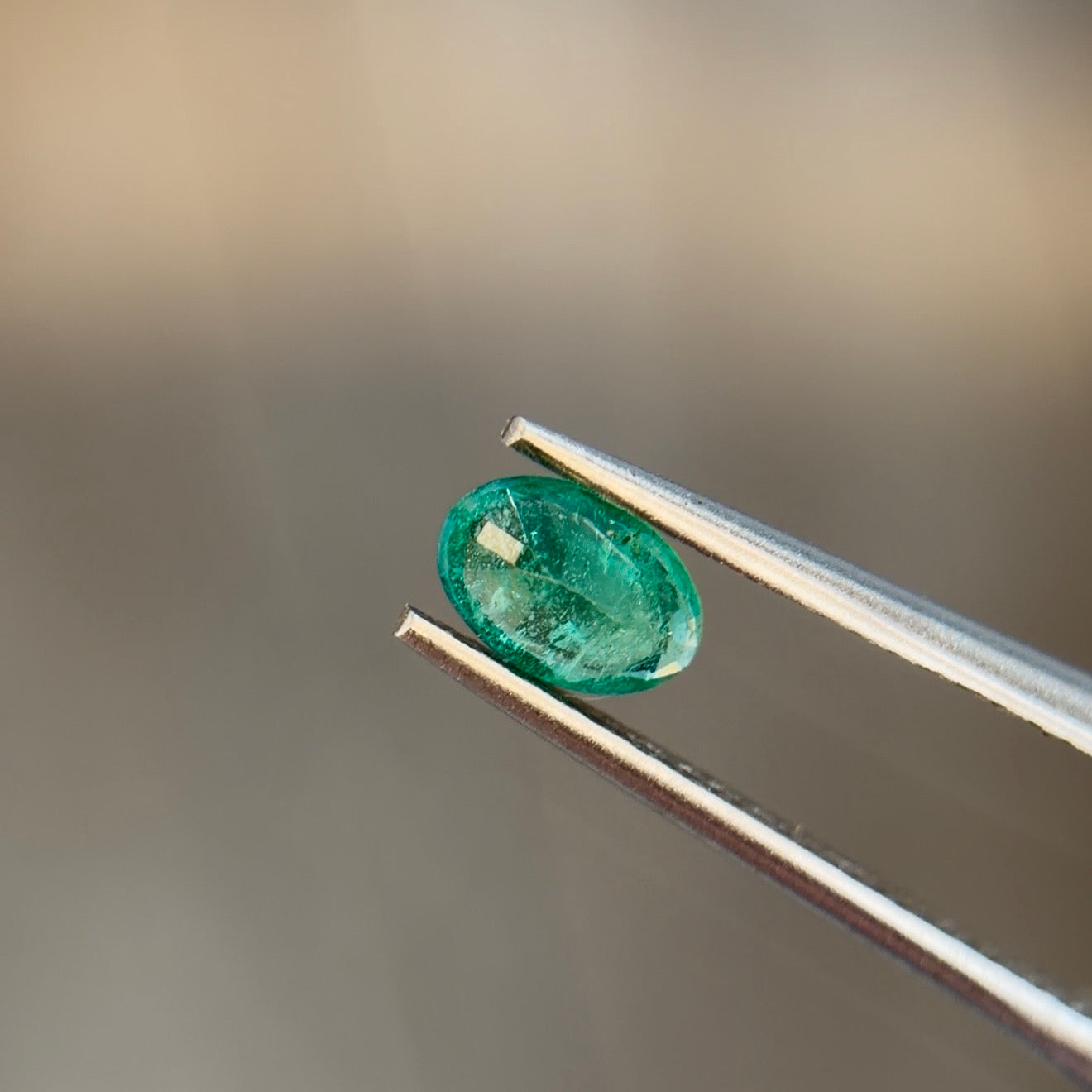 Sapphire Row 0.37 ct Natural Emerald Green, Oval Cut, Zambia, AIG Certified
