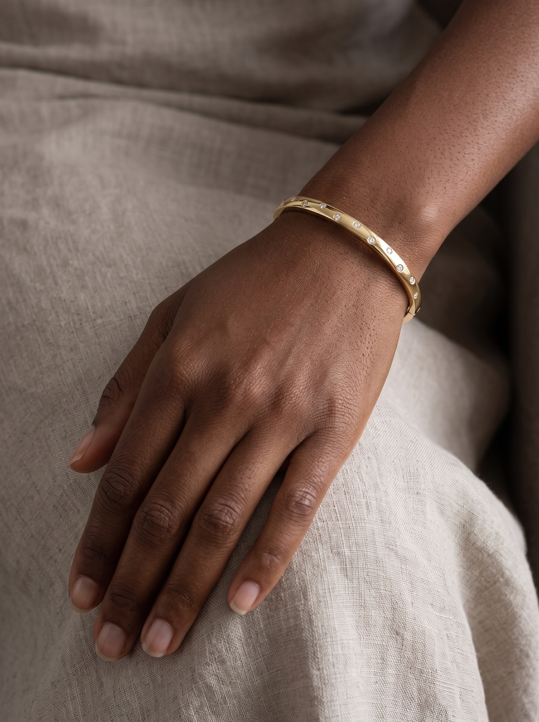 Lab-Grown Diamond Detail Bangle in 14K Yellow Gold, worn on the wrist