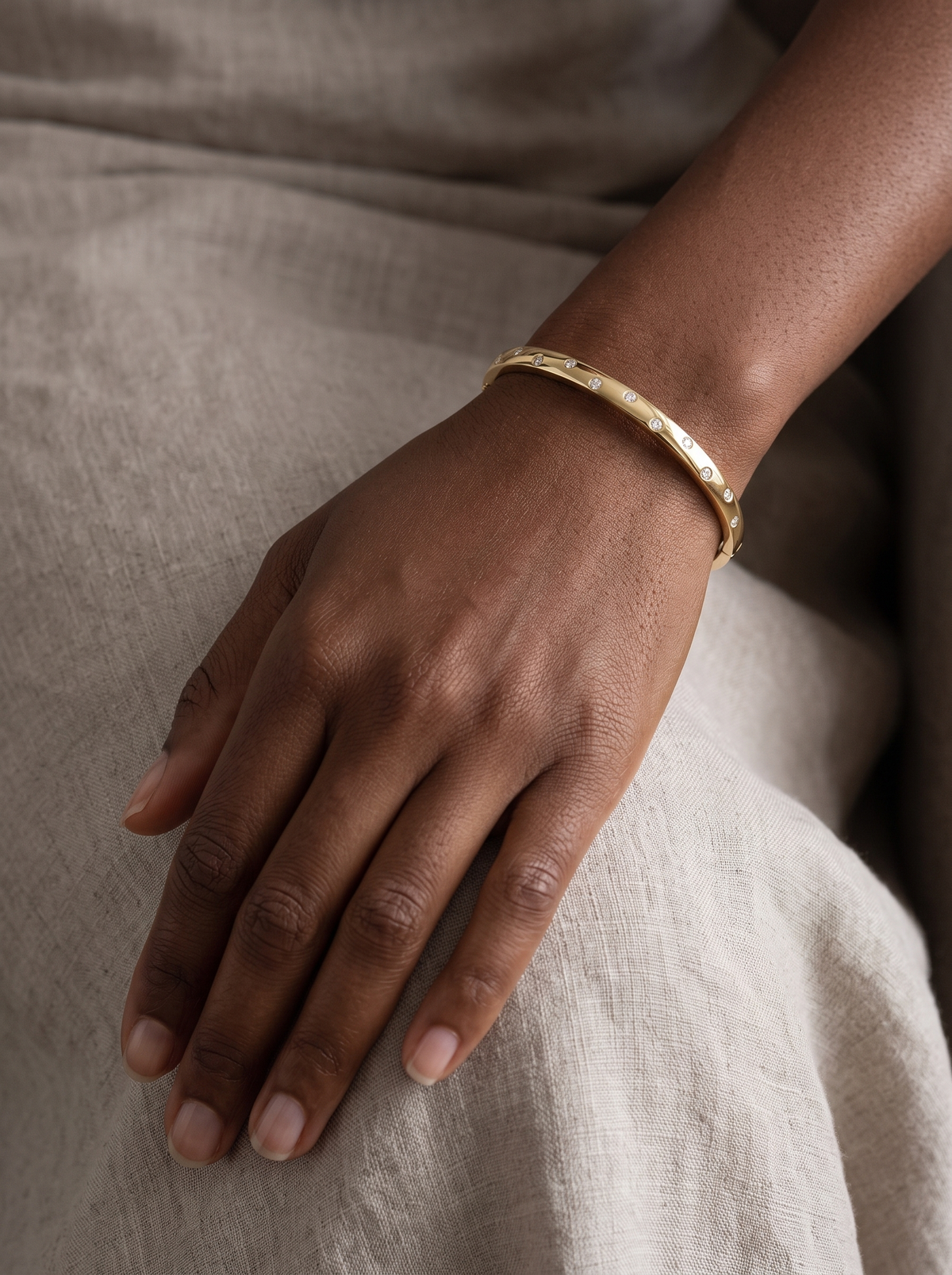 Lab-Grown Diamond Detail Bangle in 14K Yellow Gold, worn on the wrist