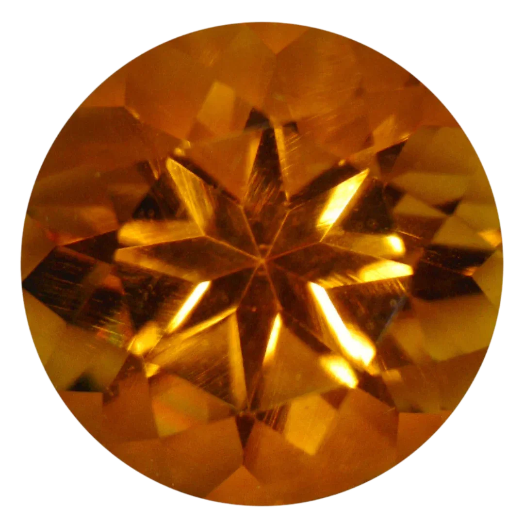 Round golden citrine gemstone with star-cut facets