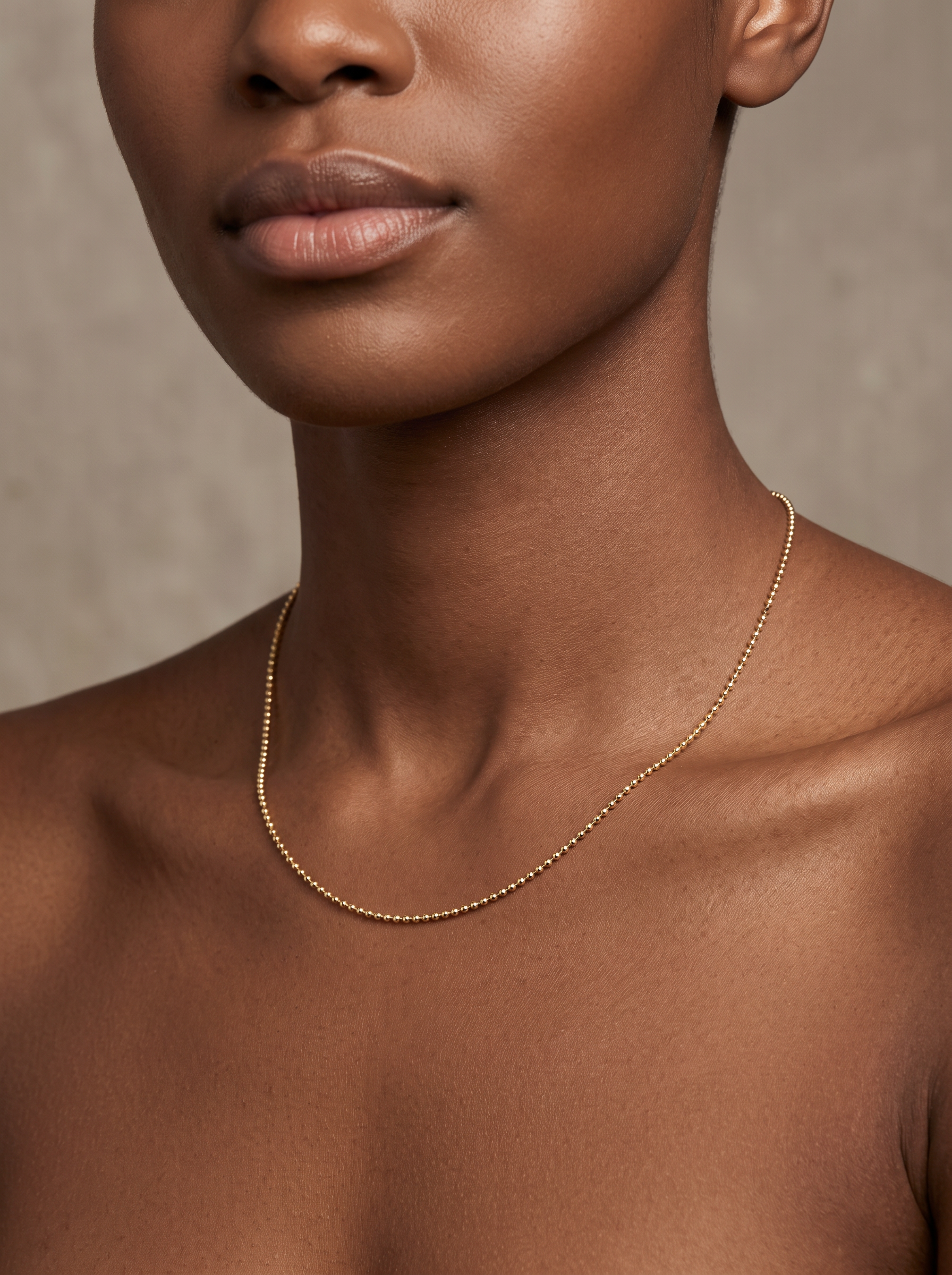 10K Gold Diamond-Cut Bead Chain Necklace, worn at the collarbone