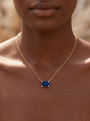 Lab-Grown Emerald-Cut Gemstone Necklace in 14K Yellow Gold, Blue Sapphire, shown close at the collarbone