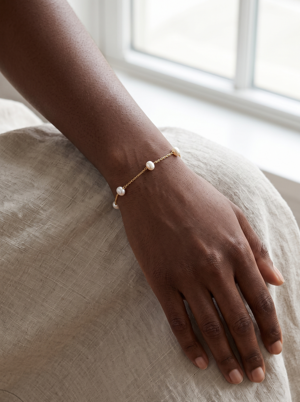 Cultured Pearl Station Bracelet in 14K Yellow Gold, worn on the wrist