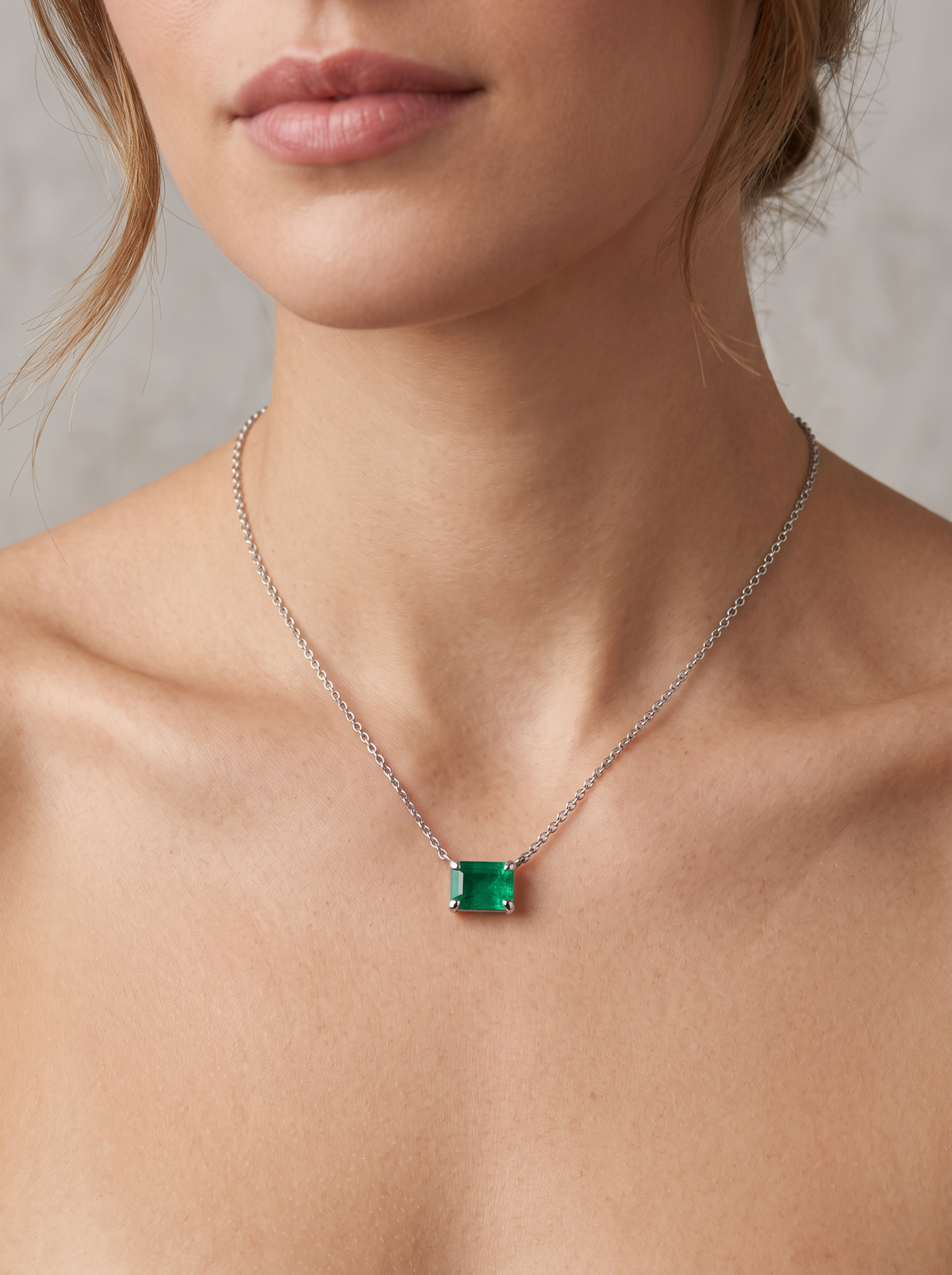 Lab-Grown Emerald-Cut Gemstone Necklace in Platinum, Emerald, shown close at the collarbone