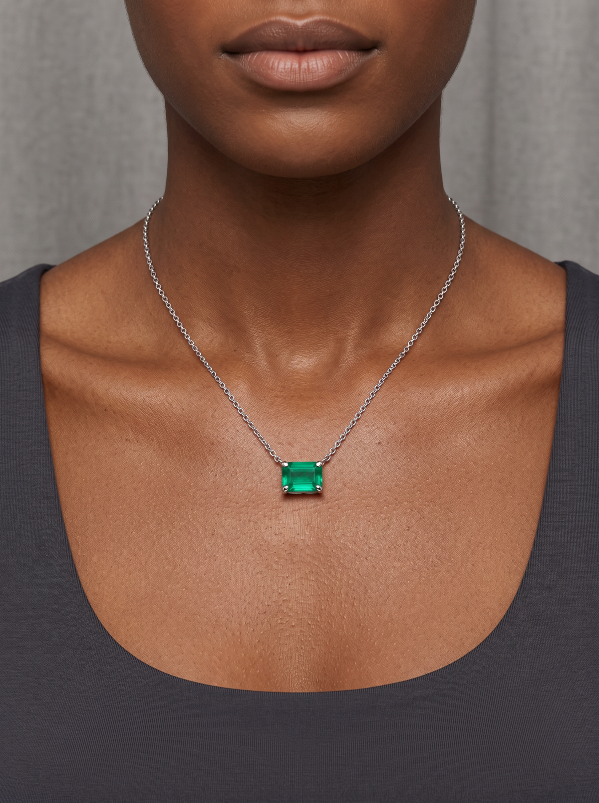 Lab-Grown Emerald-Cut Gemstone Necklace in Platinum, Emerald, worn at the collarbone