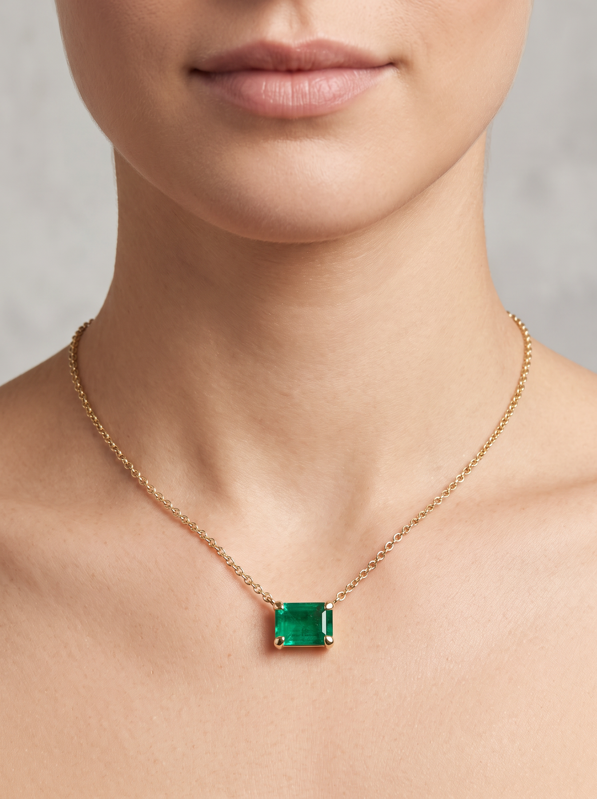 Lab-Grown Emerald-Cut Gemstone Necklace in 14K Yellow Gold, Emerald, shown close at the collarbone
