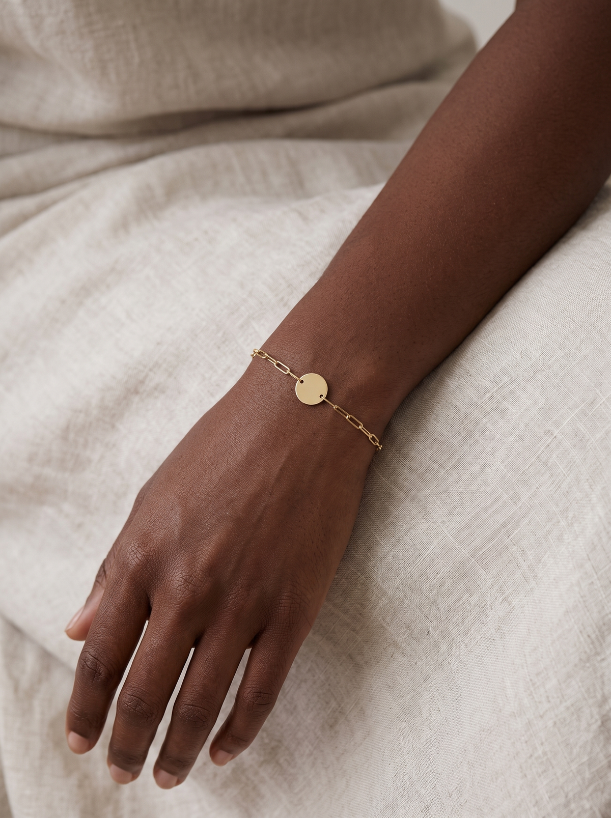 Engravable Disc Bracelet in 10K Yellow Gold, worn on the wrist