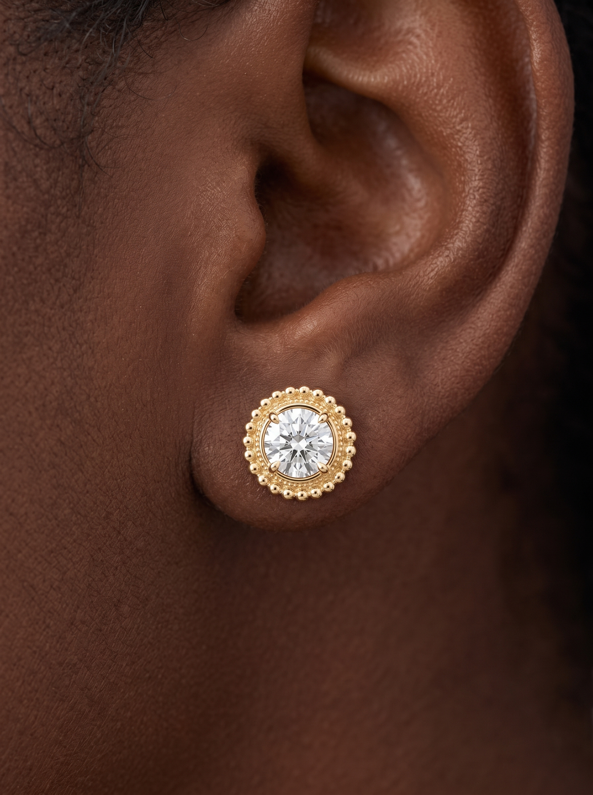 Gold Beaded Halo Jacket Earrings in 14K Yellow Gold, shown close on the ear
