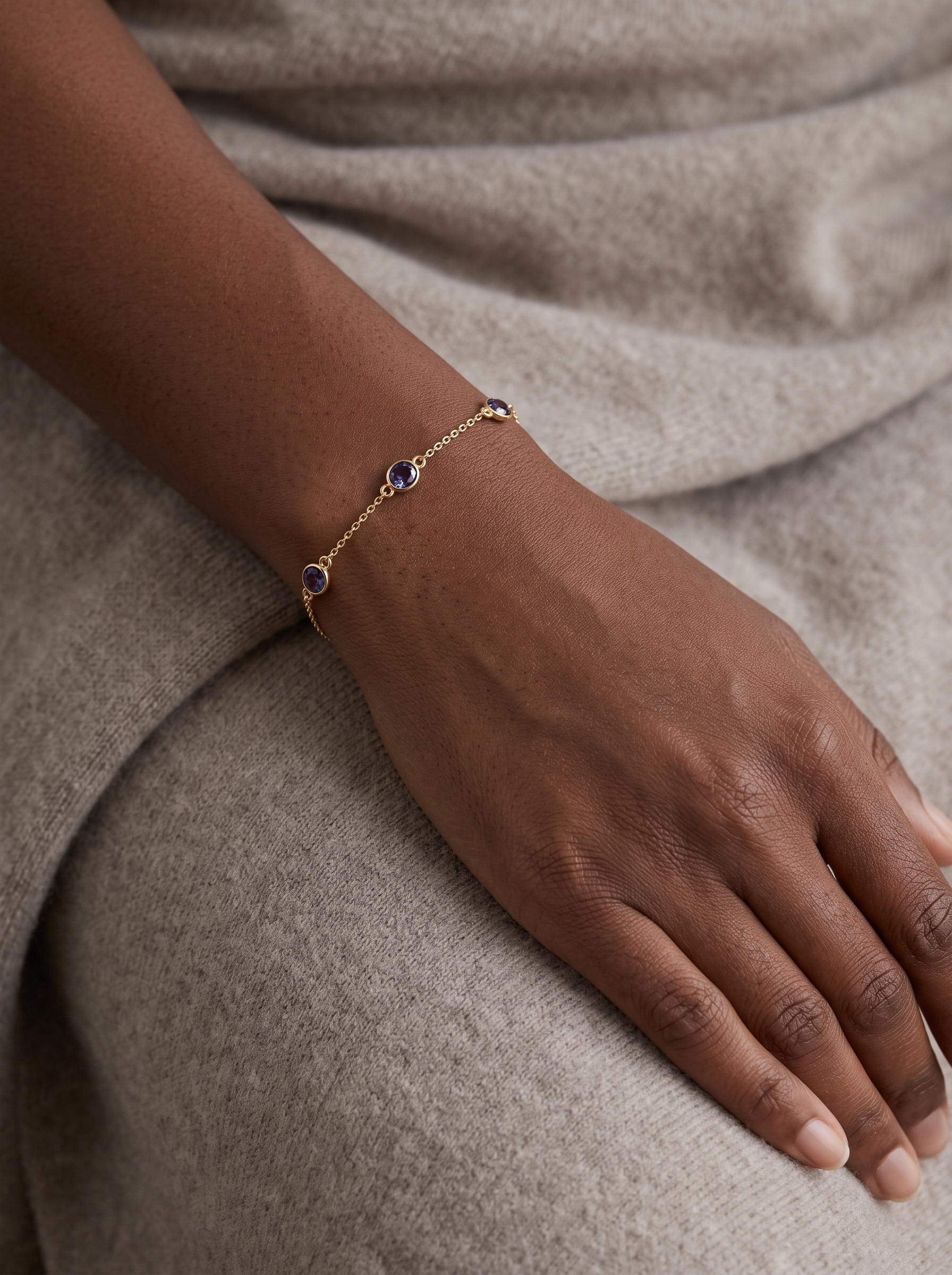 Lab-Grown Bezel-Set Gemstone Solitaire Bracelet in 14K Yellow Gold, worn on the wrist