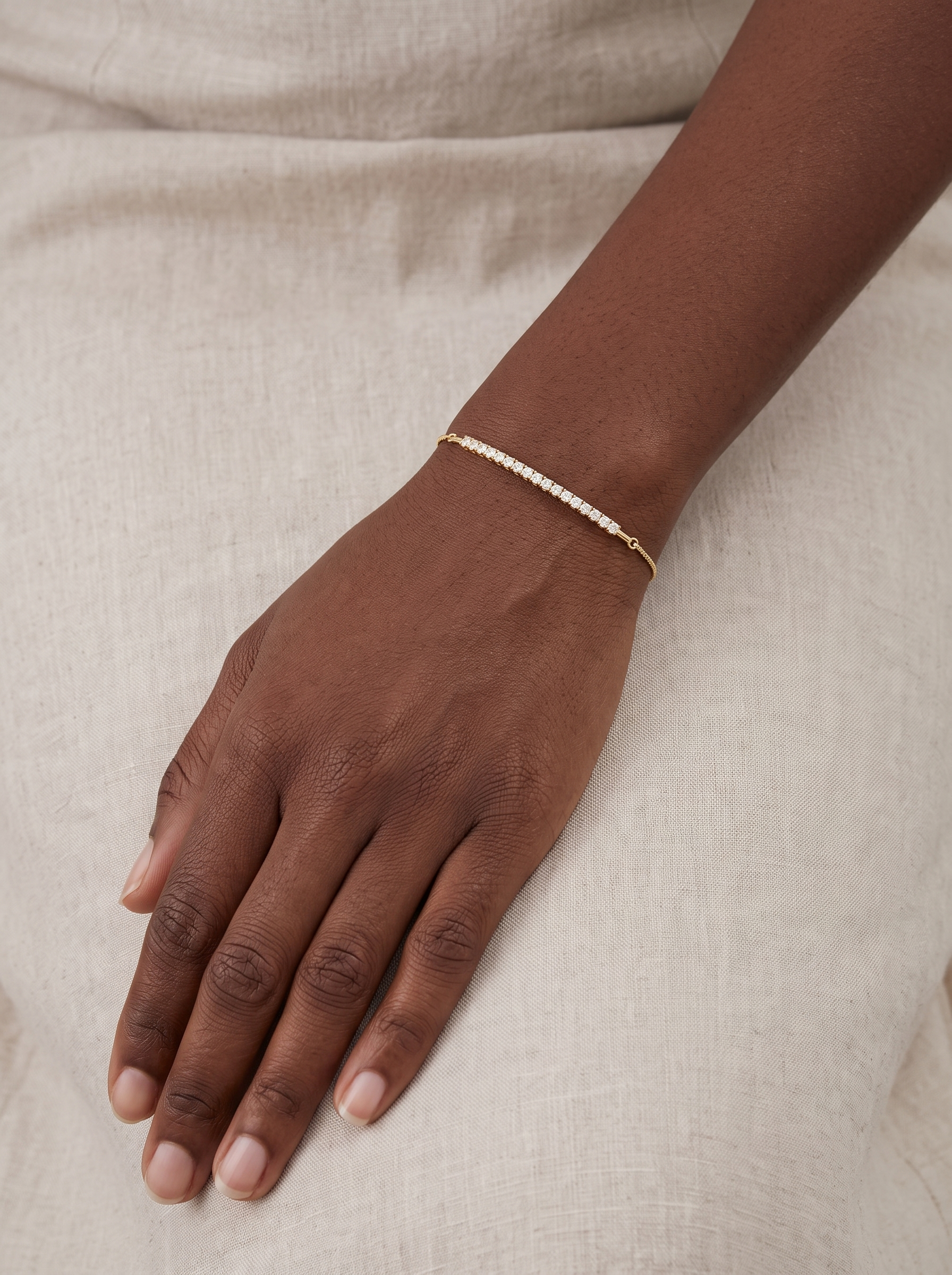 Lab-Grown Diamond Bar Bolo Bracelet in 14K Yellow Gold, worn on the wrist