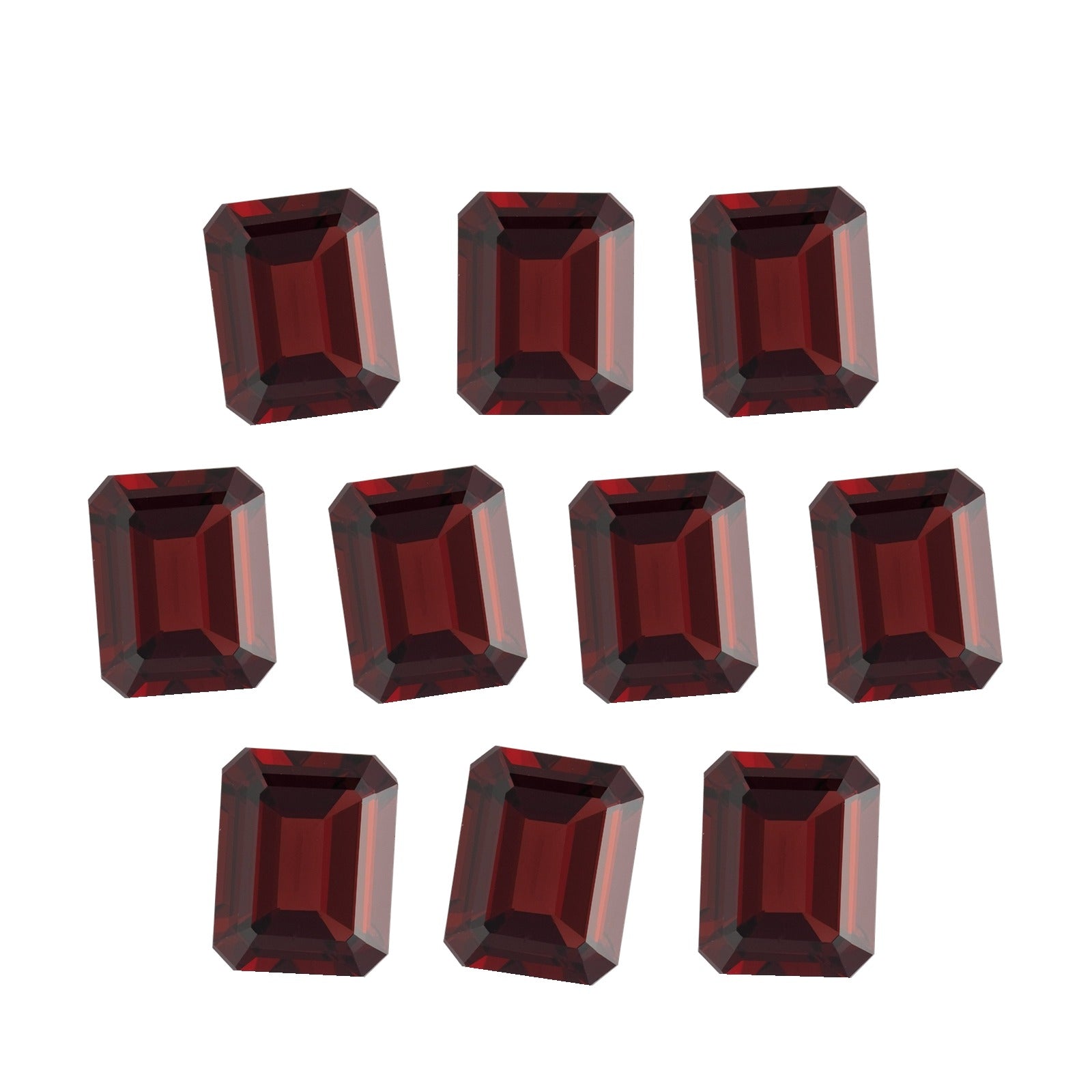 Lot of 10: 7x5 mm natural dark orange red mozambique garnet, emerald cut | Sapphire Row · cut7