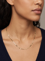 Gold Mirror Chain Necklace, shown close at the collarbone