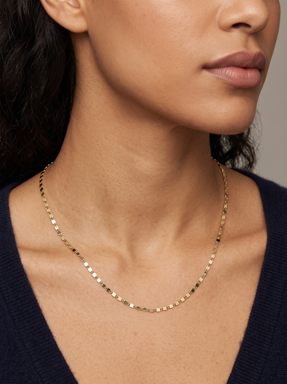 Gold Mirror Chain Necklace, shown close at the collarbone