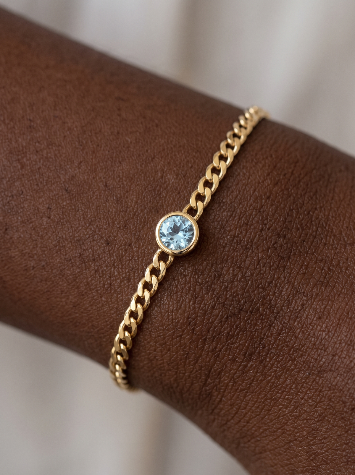 Natural Bezel-Set Gemstone Curb Bracelet, shown close on the wrist