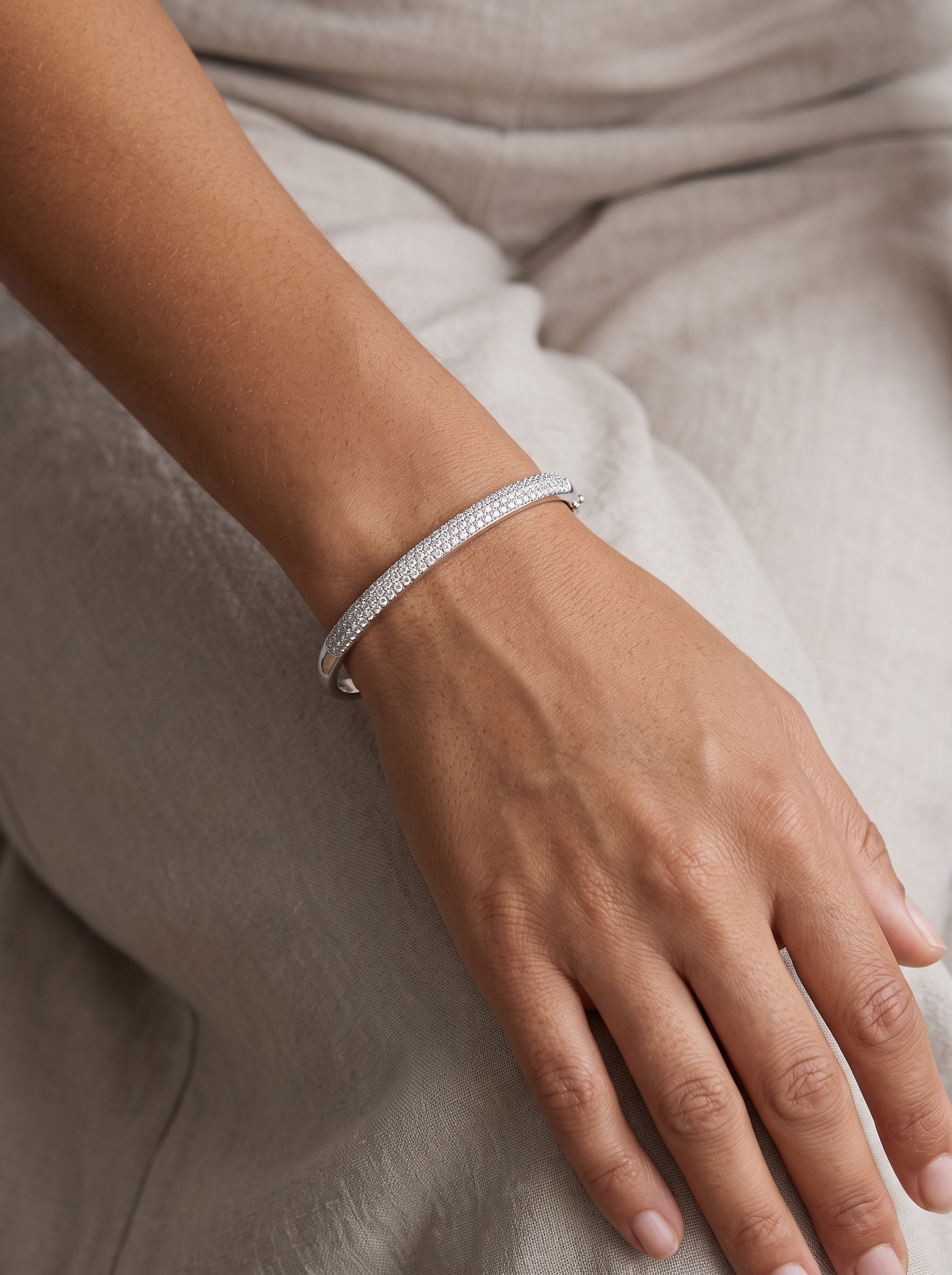 Natural Diamond French Pavé Bangle, worn on the wrist