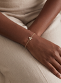 Natural Diamond Pavé Initial Bracelet in 14K Yellow Gold, worn on the wrist