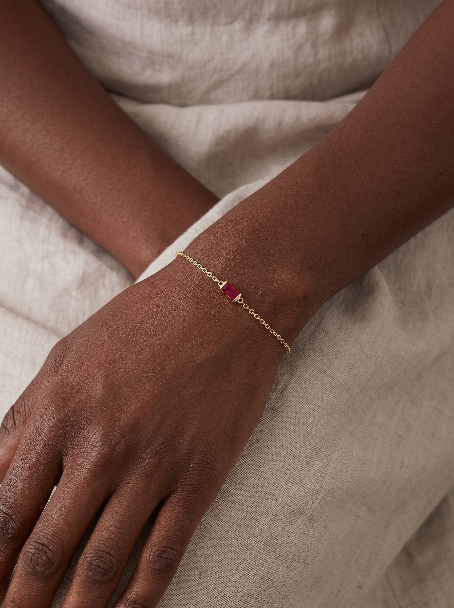 Natural Gemstone Baguette Bracelet in 14K Yellow Gold, worn on the wrist