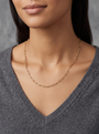 14K Gold Paperclip Chain Necklace in 14K Yellow Gold, shown close at the collarbone