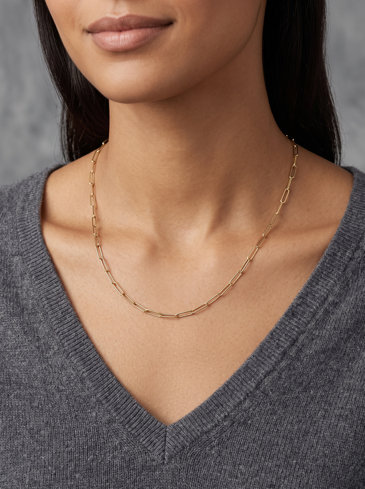 14K Gold Paperclip Chain Necklace in 14K Yellow Gold, shown close at the collarbone