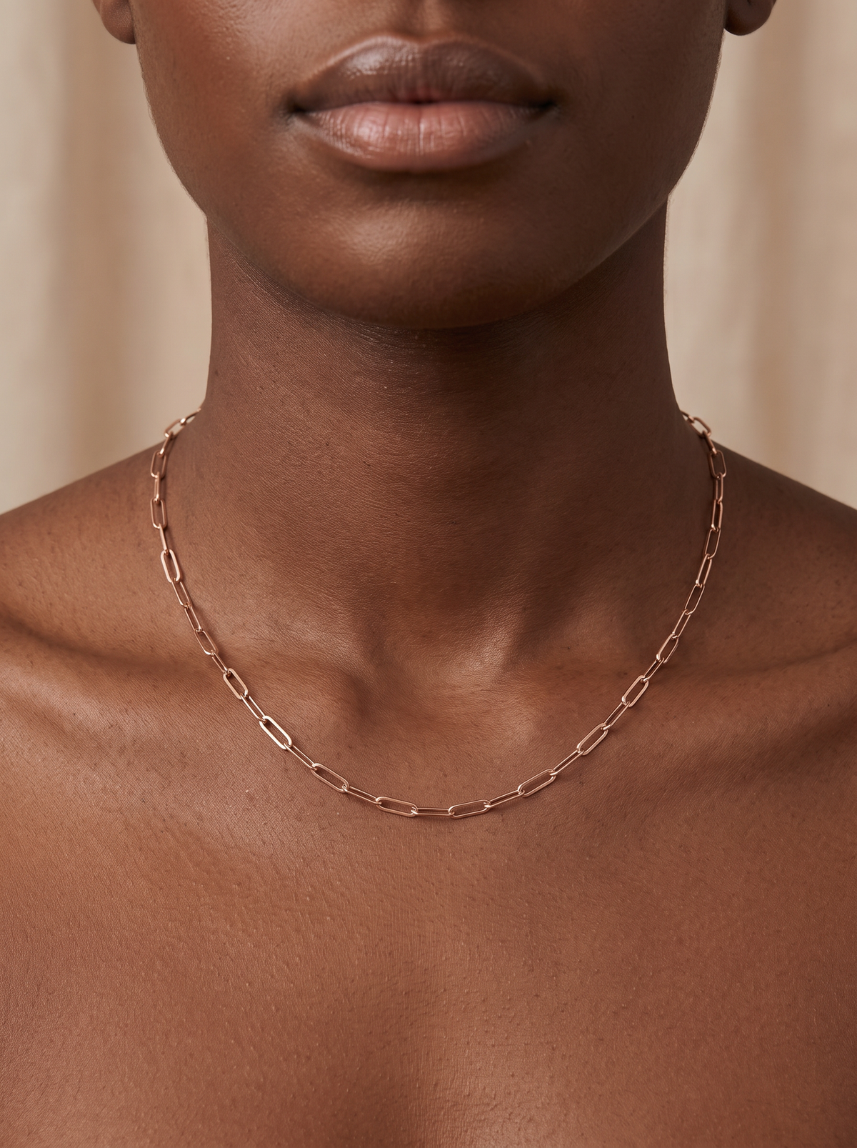 14K Gold Paperclip Chain Necklace in 14K Rose Gold, worn at the collarbone