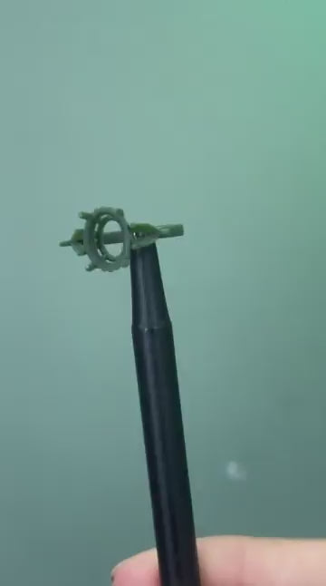 The printed model of the ring, turning