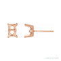 Sapphire Row Emerald 4-Prong Scroll® Stud Earrings setting in 14K Rose Gold, shown with a center stone (sold separately)