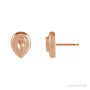 Sapphire Row Solitaire Earrings setting in 14K Rose Gold, shown with a center stone (sold separately)