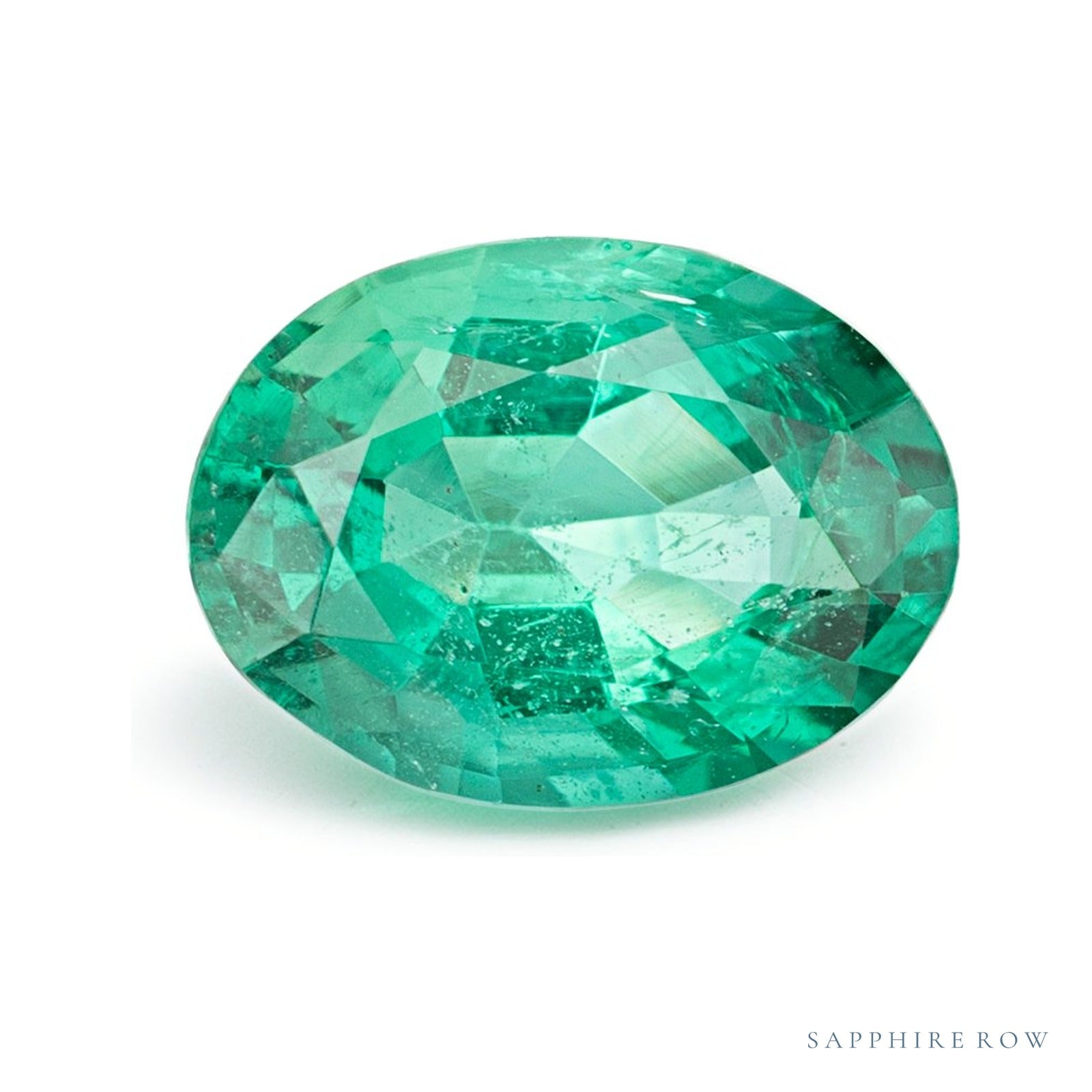 1.65 ct Oval Natural Emerald — Sapphire Row · cut4