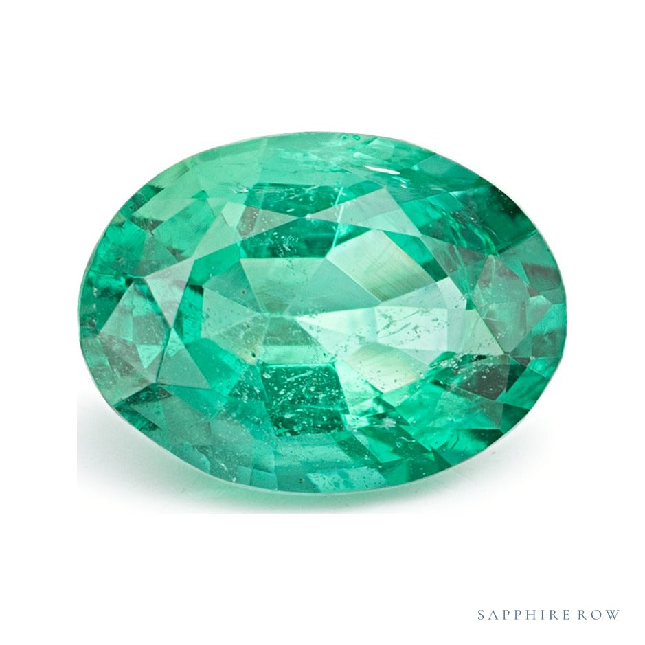 1.65 ct natural green emerald from Zambia, oval cut | Sapphire Row · cut6