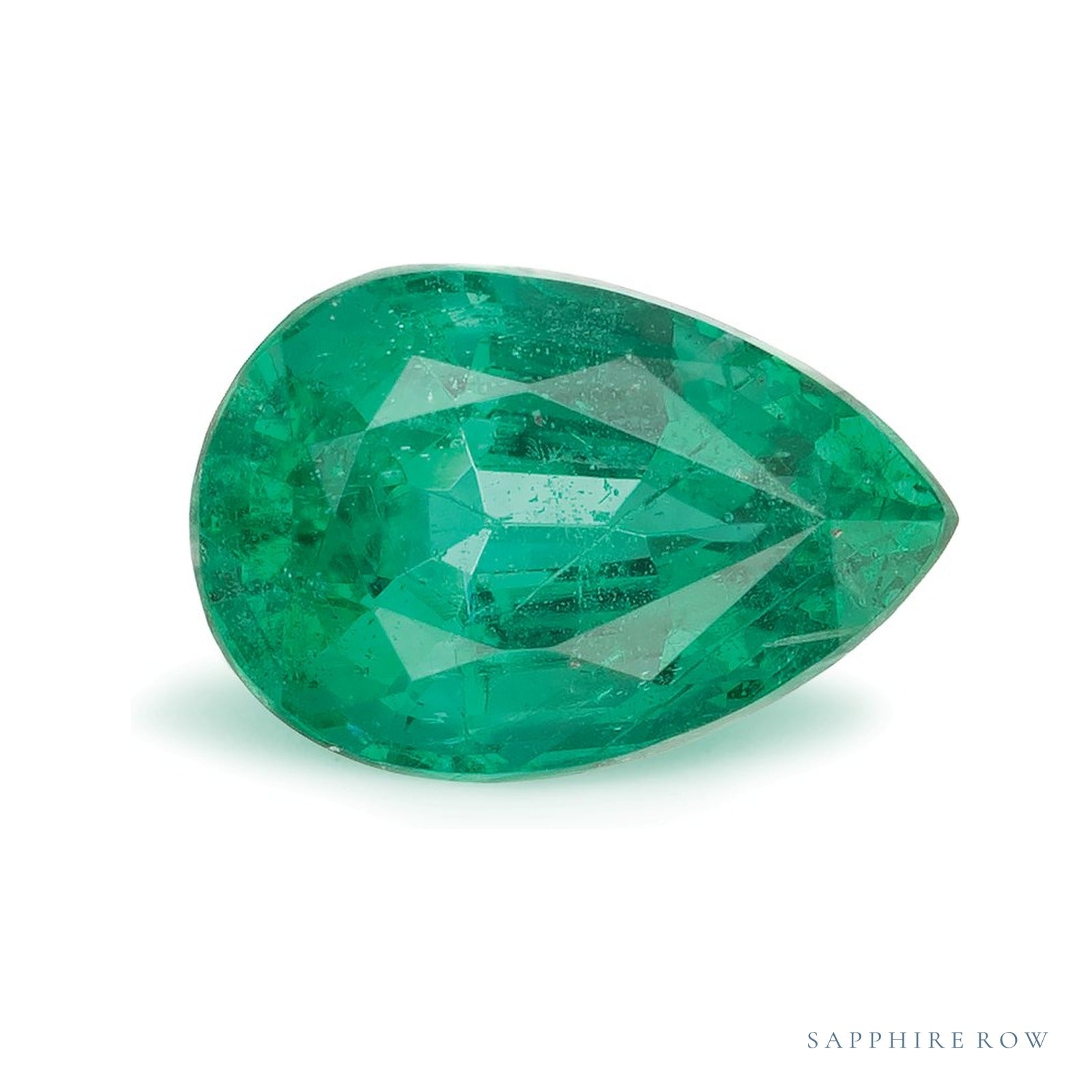 1.46 ct Pear Natural Emerald — Sapphire Row · cut4