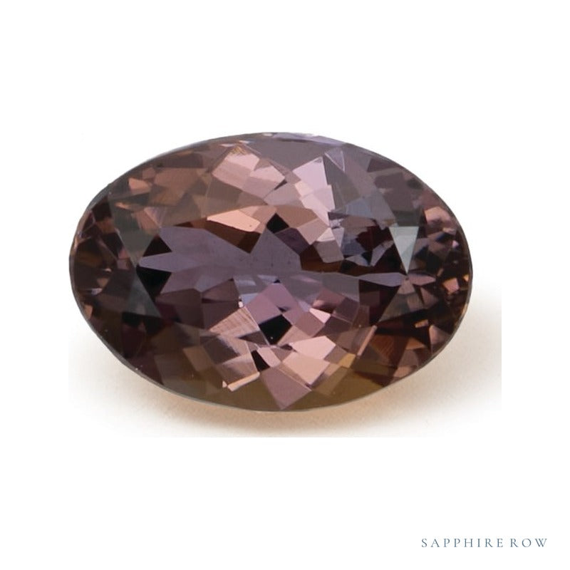 0.83 ct natural bicolor zoisite from Tanzania, oval cut | Sapphire Row · cut6