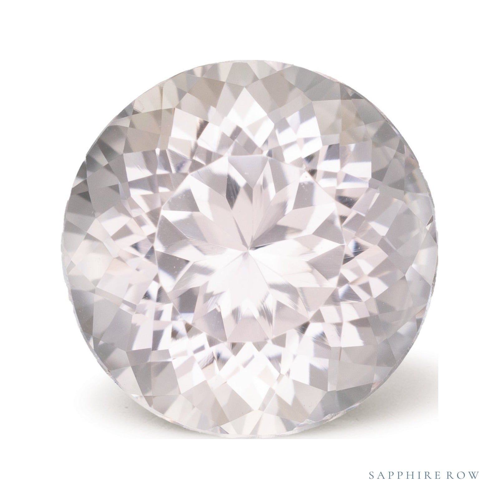8.25 ct natural pink morganite from Mozambique, round cut | Sapphire Row · cut4