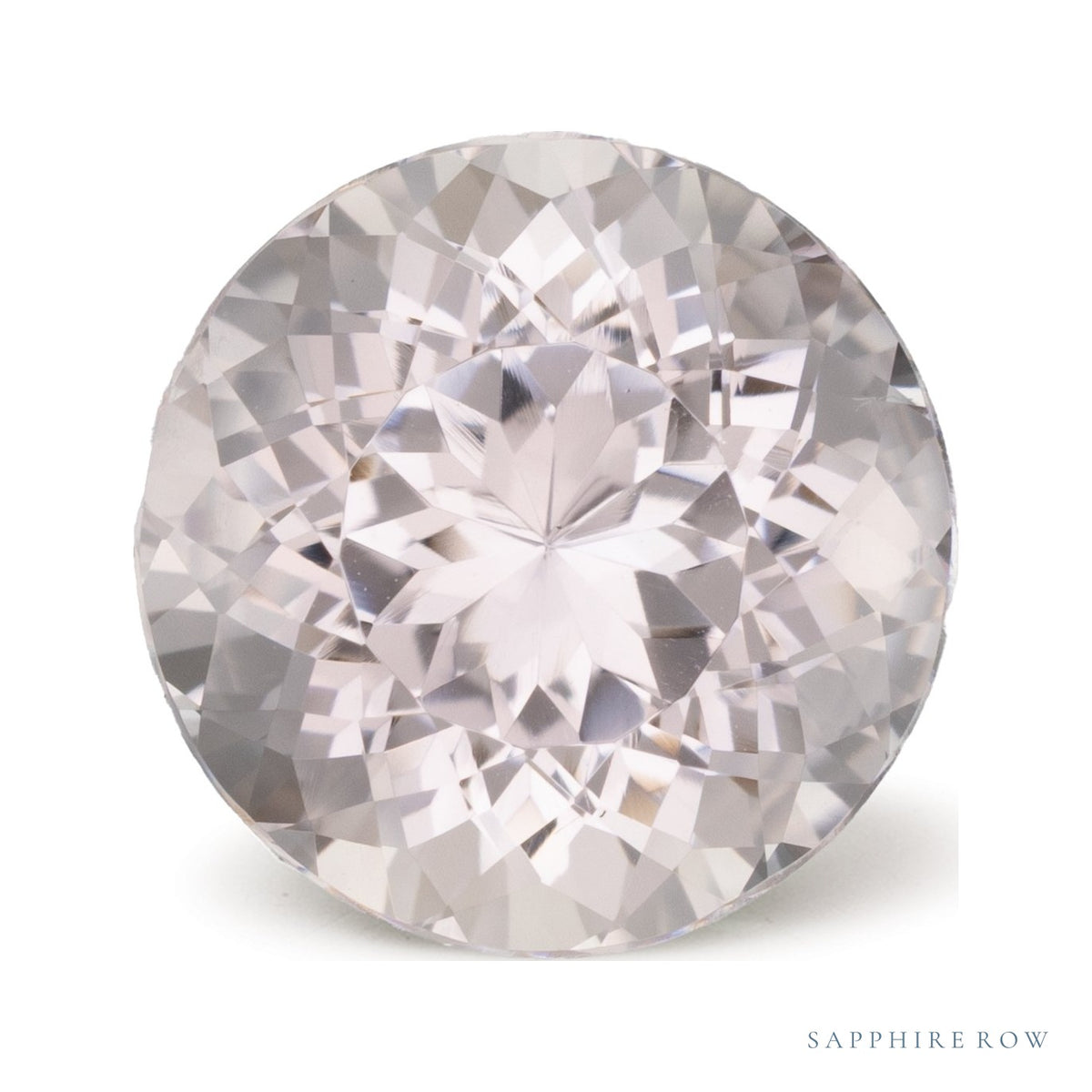 7.98 ct natural pink morganite from Mozambique, round cut | Sapphire Row · cut7