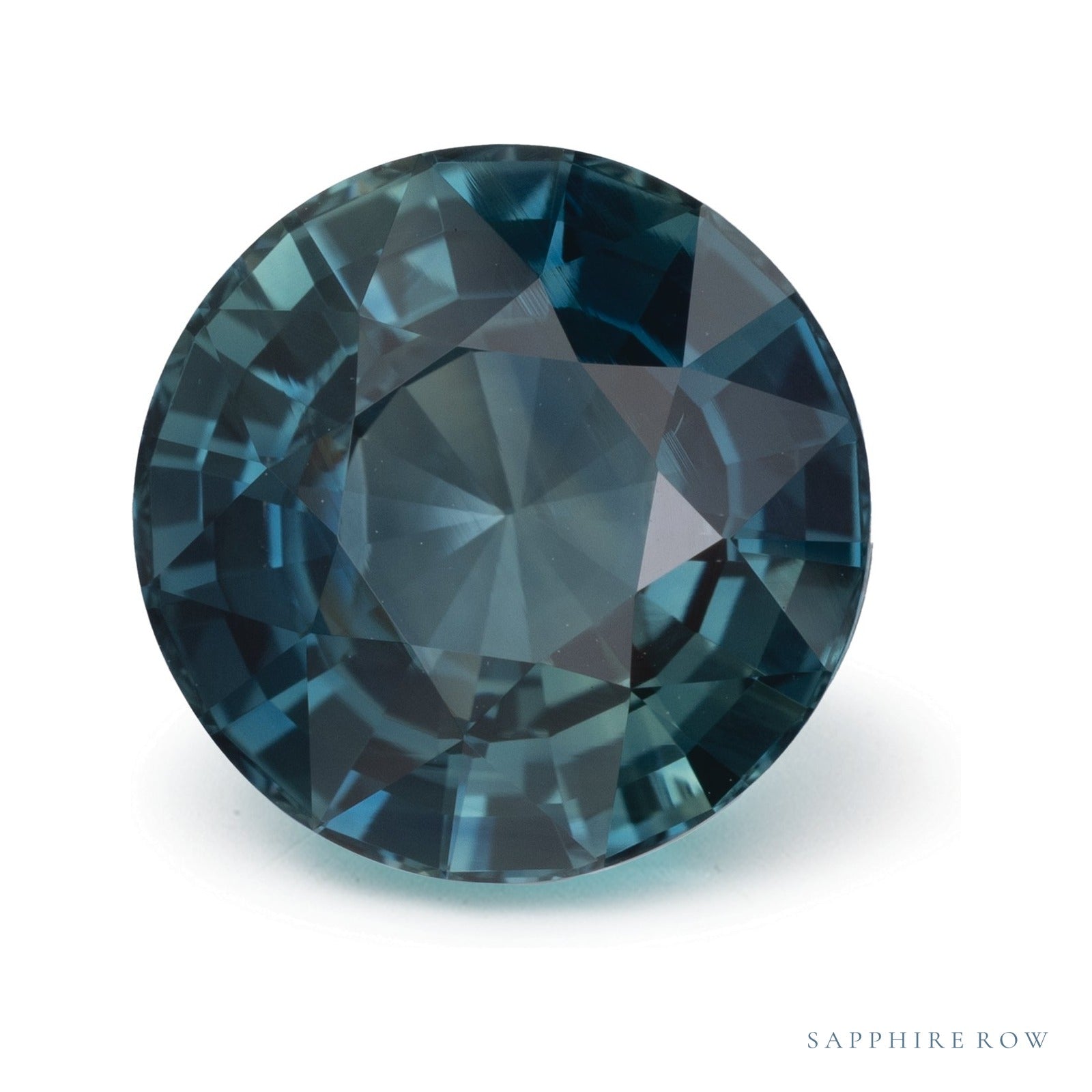 5.54 ct natural teal sapphire from Mozambique, round cut | Sapphire Row · cut4