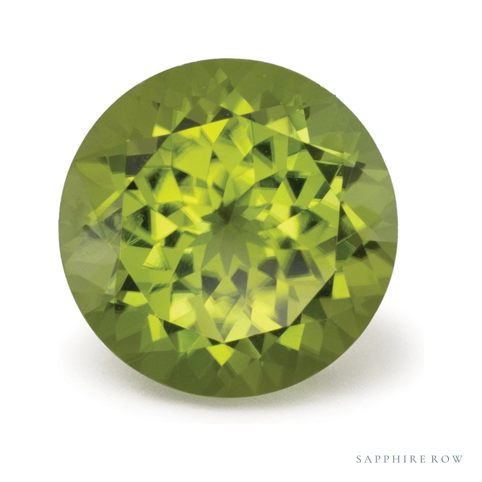 3.98 ct natural green peridot from Pakistan, round cut | Sapphire Row · cut4